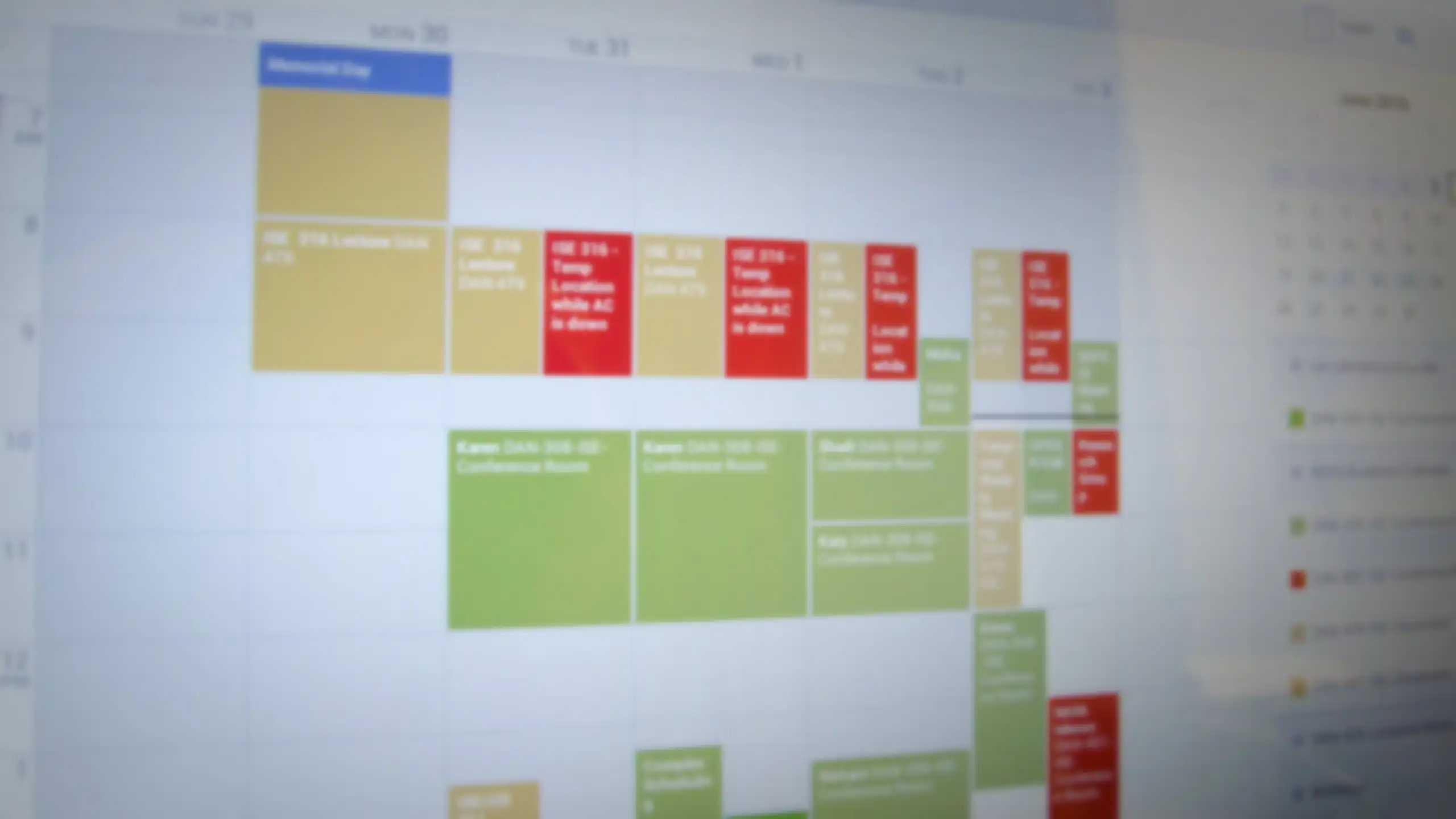 A screenshot of a Google Calendar with many room reservations filling up the calendar.